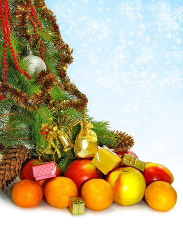  Christmas tree decorated with Christmas toys and different fruitsの写真素材