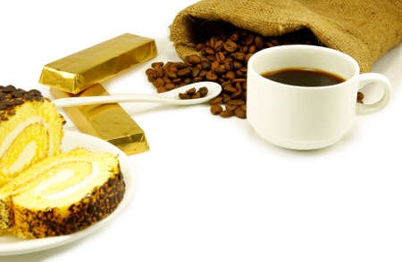 cup of coffee, chocolate, rolls and coffee beansの写真素材