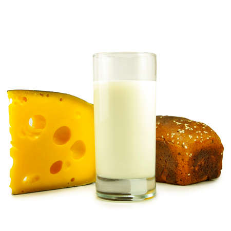 Isolated image of a glass of milk, cheese and bread on a white backgroundの写真素材