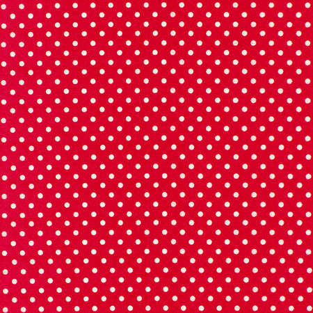 image of red fabric with white polka dotsの写真素材