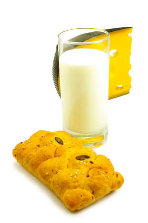 Isolated image of a glass of milk, cheese and cakeの写真素材