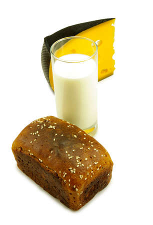 Isolated image of a glass of milk, cheese and breadの写真素材