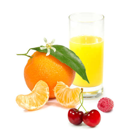 Isolated image of different fruits and glass of orange juiceの写真素材
