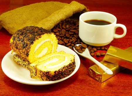 coffee in the Cup, roll on a plate, coffee beansの写真素材