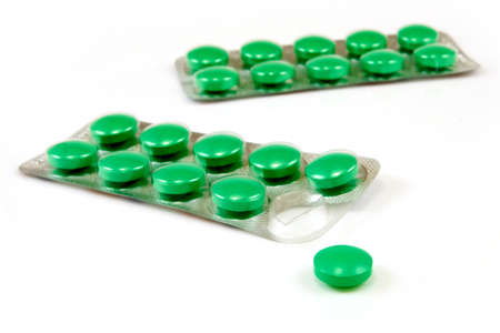 Isolated image of green pills on white backgroundの写真素材
