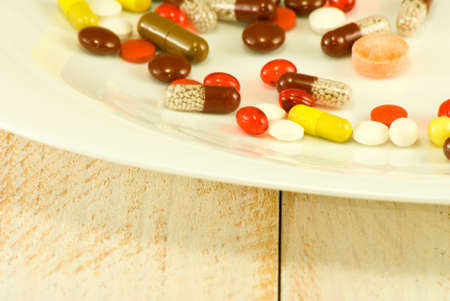 image of different pills on the tableの写真素材