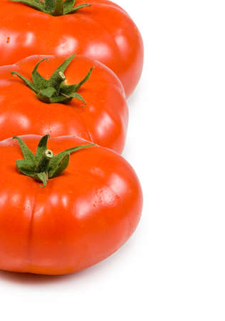 isolated image of three tomatots on white background   の写真素材