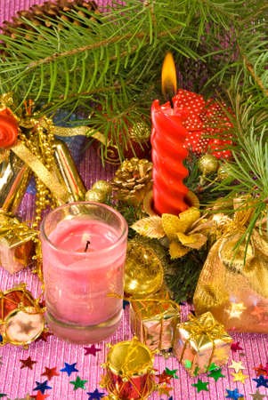 candles on different Christmas decorationsの写真素材