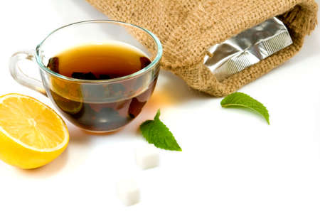 isolated image of a cup of tea with lemon and mintの写真素材