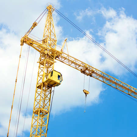 image of crane on blue sky background