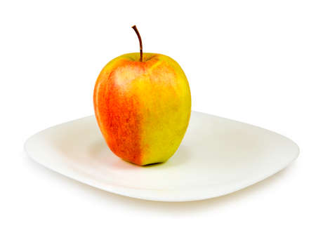 image of an apple on a plateの写真素材