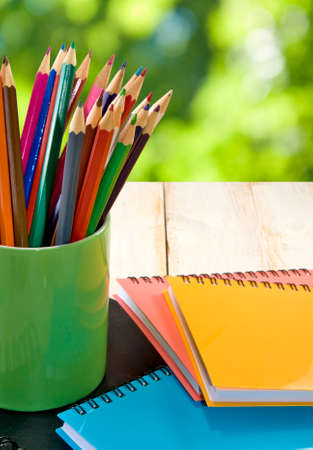 image of a notebook and pencil