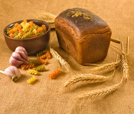 image of pasta, bread, garlic and wheat closeupの写真素材