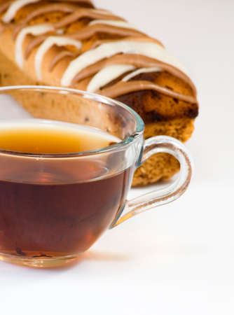 Isolated image of tea and roll closeupの写真素材