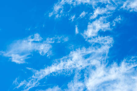 image of blue sky and clouds closeupの写真素材