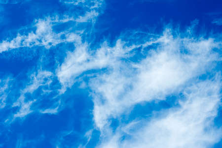 image of blue sky and clouds closeupの写真素材