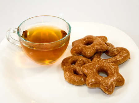Isolated image of tea and cookies on a white backgroundの写真素材