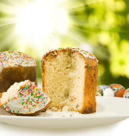 image of Easter cupcakes and eggs on a green background
