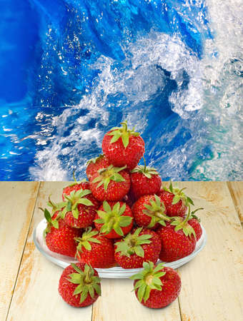 image of strawberries on water backgroundの写真素材