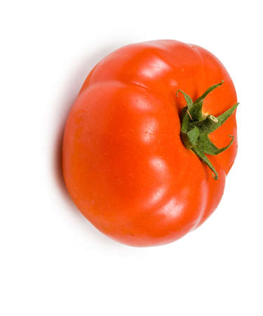Isolated image of one Â  tomatoes on white backgroundの写真素材