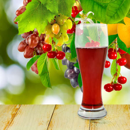 image of beverage on fruits backgroundの写真素材