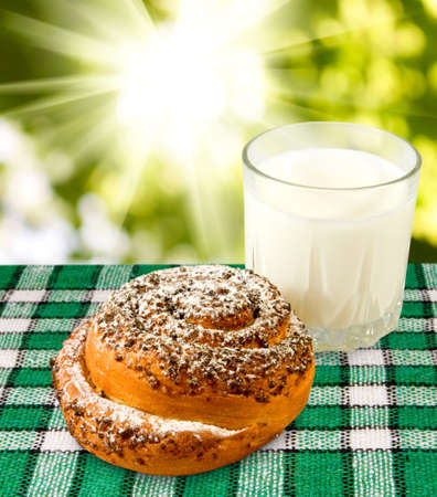 bread and milk on a green backgroundの写真素材