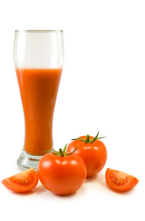 image of tomatoes and a glass of juice on a white backgroundの写真素材