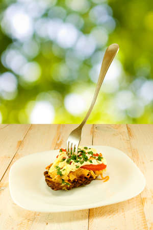 image of cutlets with a fork on a plateの写真素材