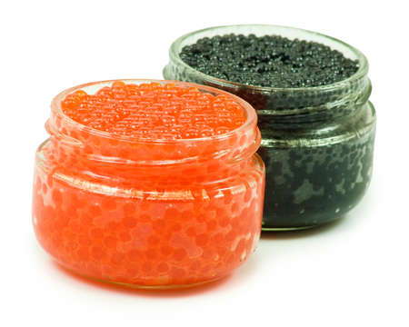 two jars red and black caviar on a white backgroundの写真素材
