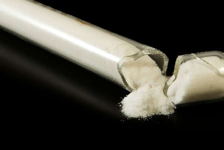 Image of broken tube with powderの写真素材