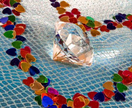 image of diamond in the center of the heart on a blue backgroundの写真素材