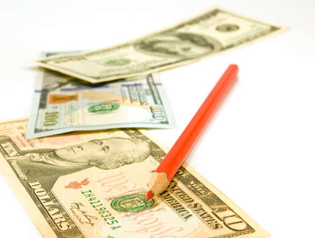isolated image of dollars and pencil closeupの写真素材