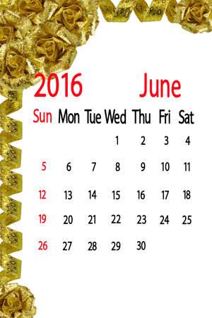 calendar for the month of June on  yellow bow  backgroundの写真素材