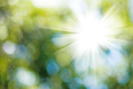 abstract image of the sun on a green backgroundの写真素材