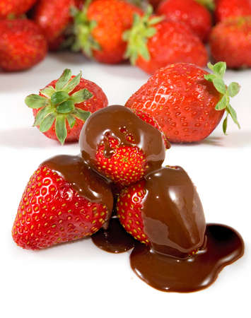 Isolated image of ripe strawberries in chocolate on a white backgroundの写真素材