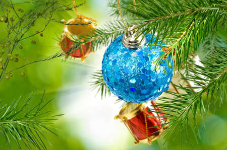 Christmas decorations on the Christmas tree closeupの写真素材