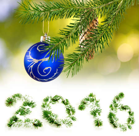 Christmas decorations on a green background closeup