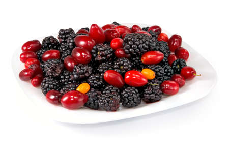 image of dogwood and blackberry on a plate closeupの写真素材