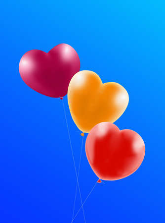 image of multi colored balloon on a blue background close-upの写真素材