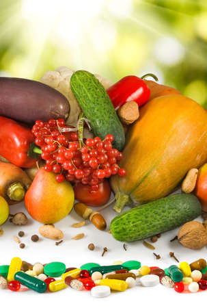 image of different vegetables and pills closeupの写真素材