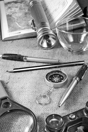 atlas, binoculars, ruche, cups, magnifiers and flashlightの写真素材