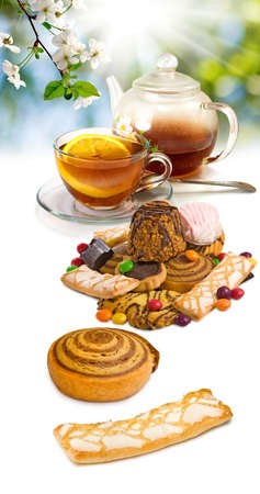 image of a cup of tea and cookies close upの写真素材