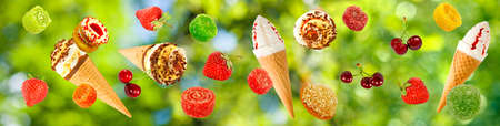 Image of ice cream and berries on a green backgroundの写真素材