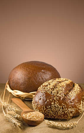 image of bread and wheat in spoon closeupの写真素材
