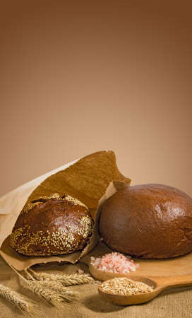 image of bread and wheat in spoon closeupの写真素材