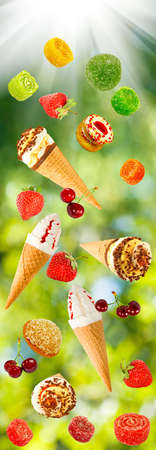 ice cream and berries on a green backgroundの写真素材