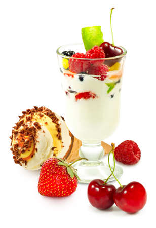 isolated image of yogurt in a glass with fruit on a white background closeupの写真素材
