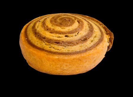 image of single cookie on black background close-upの写真素材