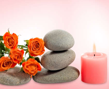 image of stones, flower and candle close-upの写真素材