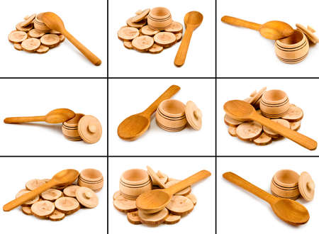 Isolated image of a wooden spoon and  bowl on a board on a white backgroundの写真素材